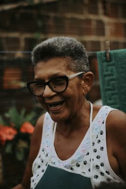 A parent laughing mid-story
